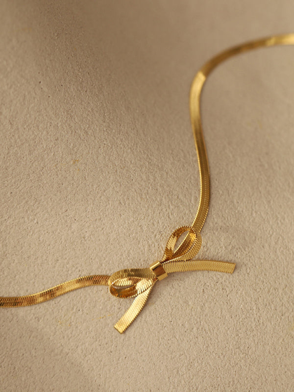 Niche basic snake bone chain bow fresh and sweet necklace earrings